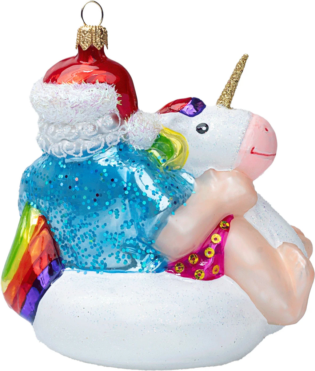 Santa Claus with inflatable Unicorn